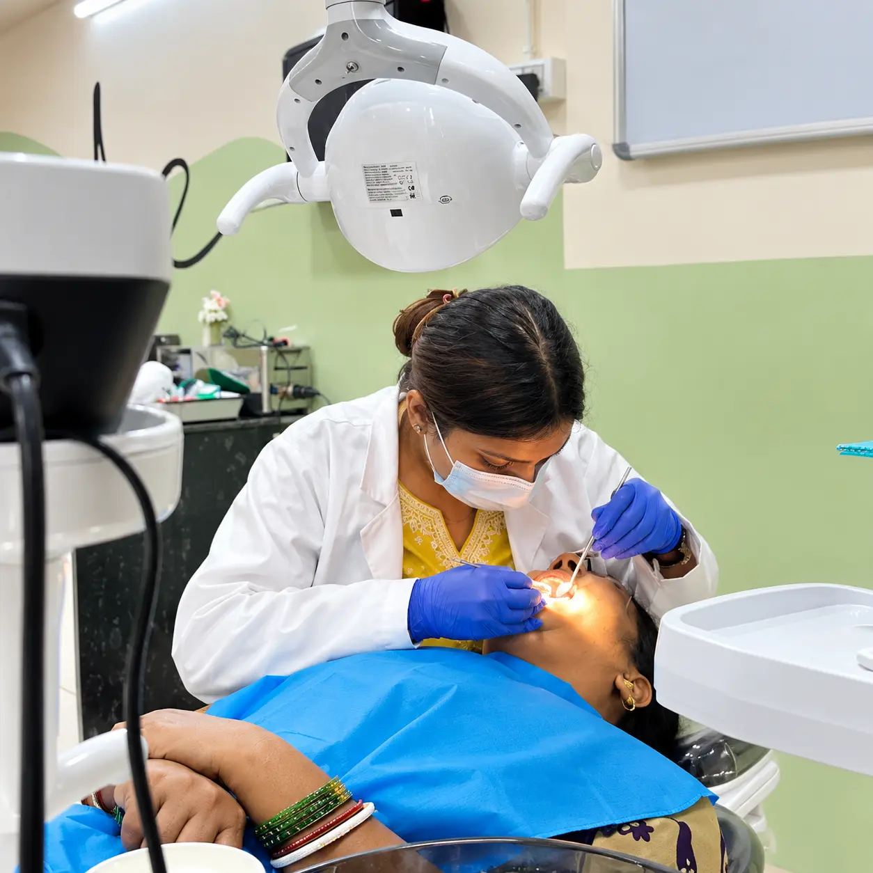 Tooth extraction is performed by the doctor N H Noori at S & I Dental Clinic